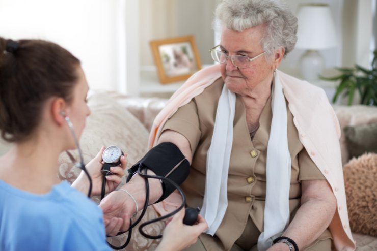 nurse-measuring-bp nurse measuring blood pressure