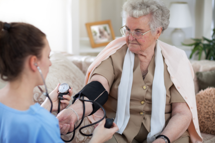 nurse measuring blood pressure