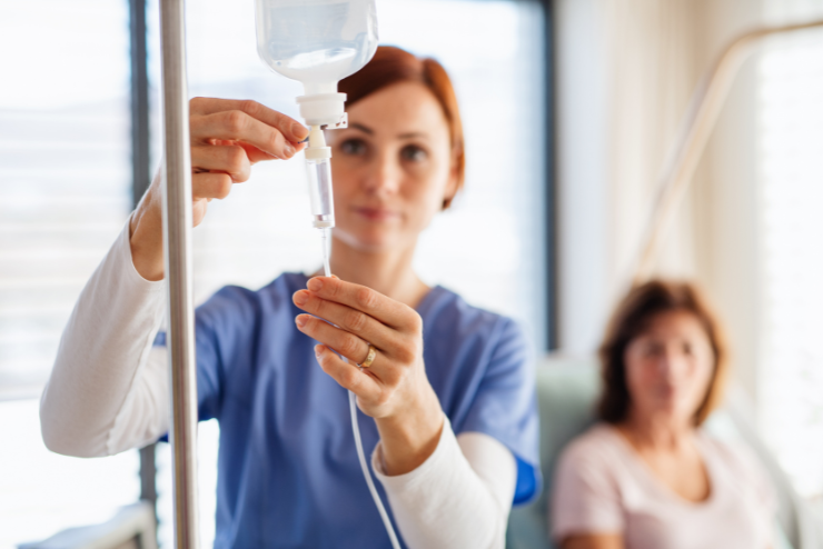 nurse performing iv therapy