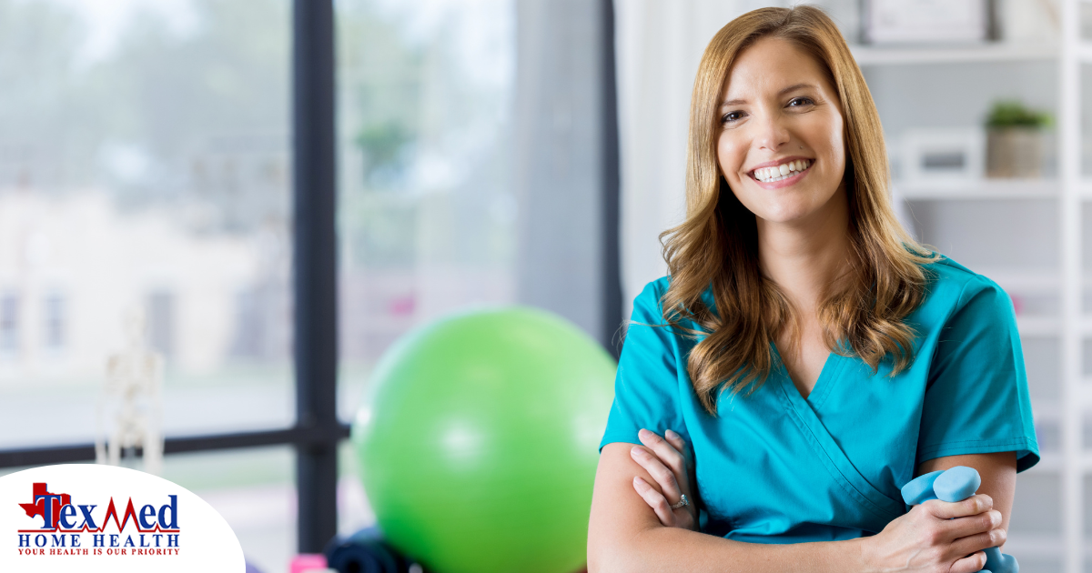 A physical therapist smiles as a result of enjoying her career.