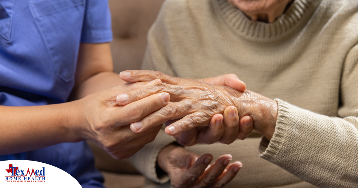 A nurse check where a patient’s hand is hurting in order to help with pain management.