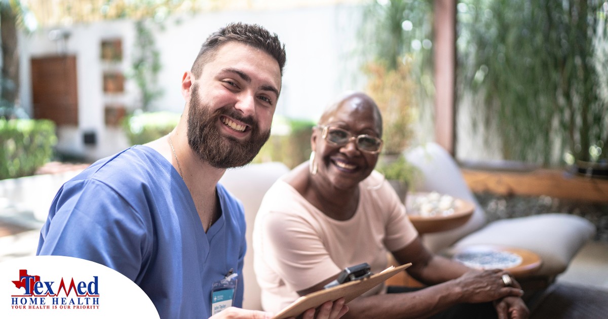 A man enjoys his caregiver job as he works with a client.