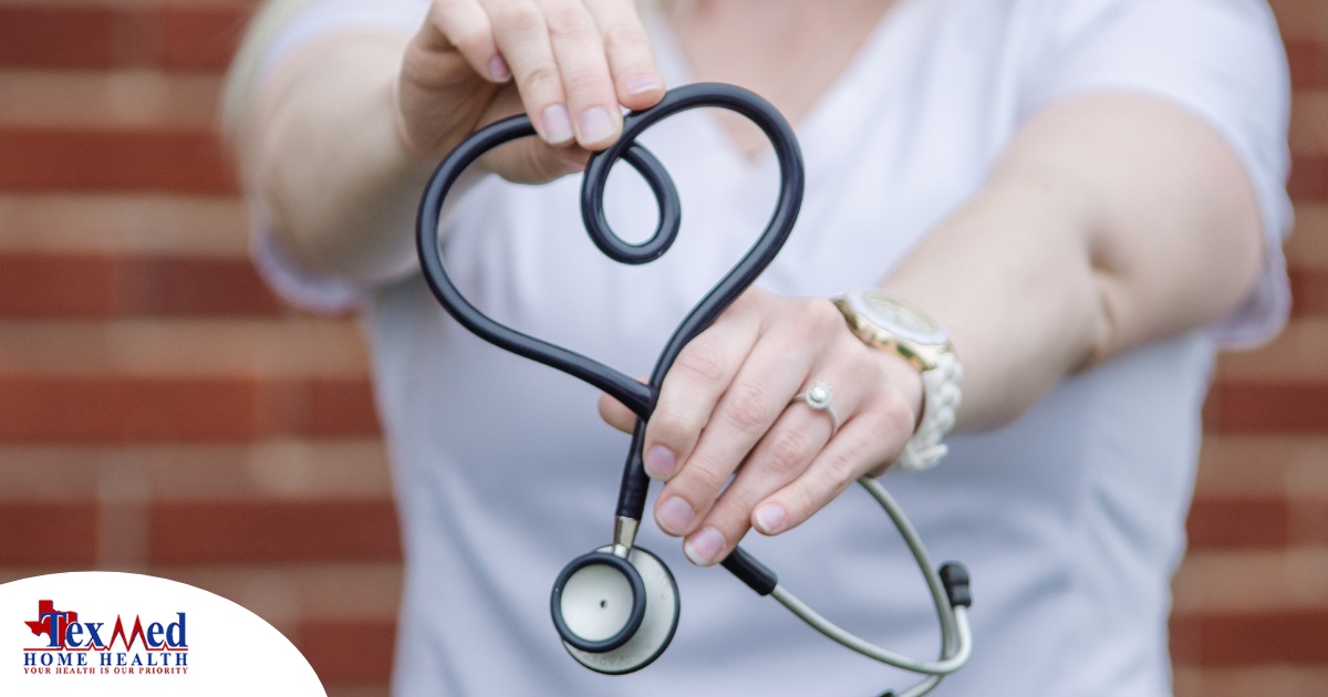 A stethoscope held in a heart represents the self-care that home health workers need to prioritize.