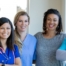 A variety of happy healthcare workers represent the results of good collaboration between home health professionals.