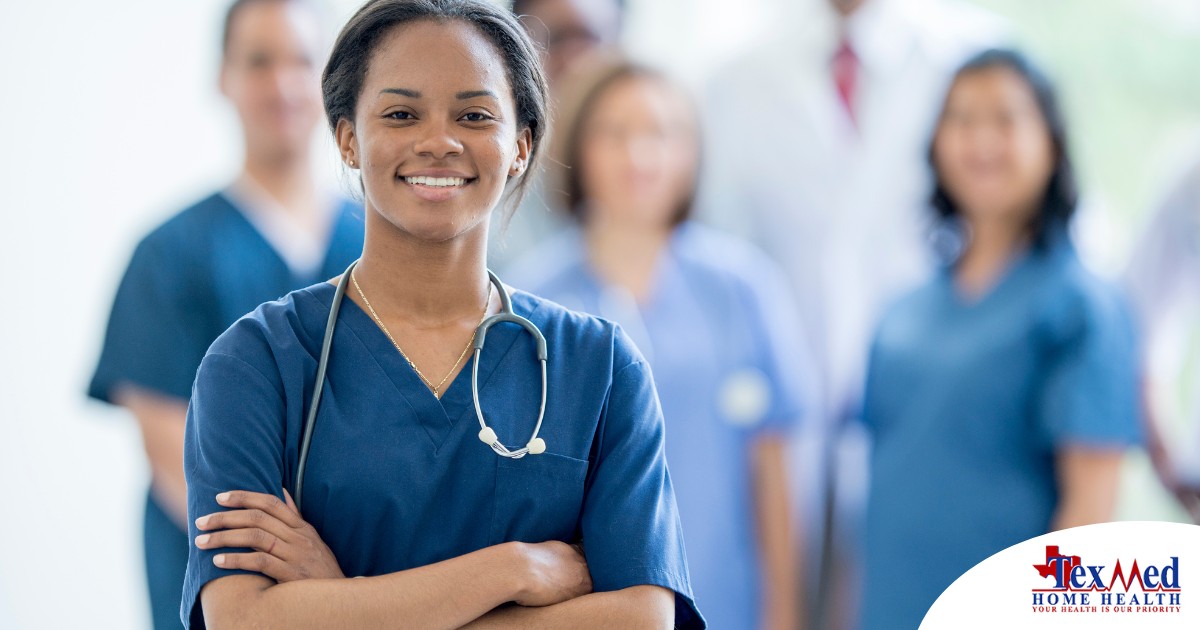 A woman in scrubs with a healthcare team behind her represents starting a new home health care job with a confident approach.