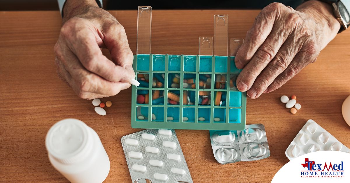Older hands organize pills into a pill organizer, showing a great tool for managing medications.