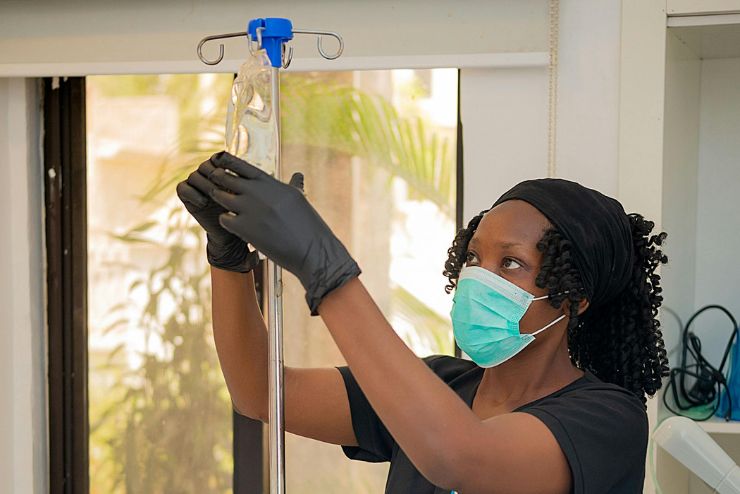 Intravenous (IV) Therapy in Waco Longer Alt Text Intravenous (IV) Therapy in Waco, TX - TexMed Home Health nurse preparing an IV treatment during an in-home visit