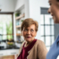 Caregiver provides attentive senior care as part of diabetes awareness